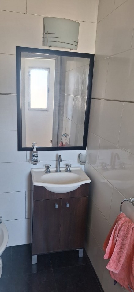 DEPARTAMENTO EN PH DE 2 AMBIENTES CON BALCON TERRAZA Y COCHERA.